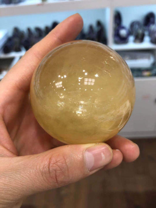 Honey calcite sphere