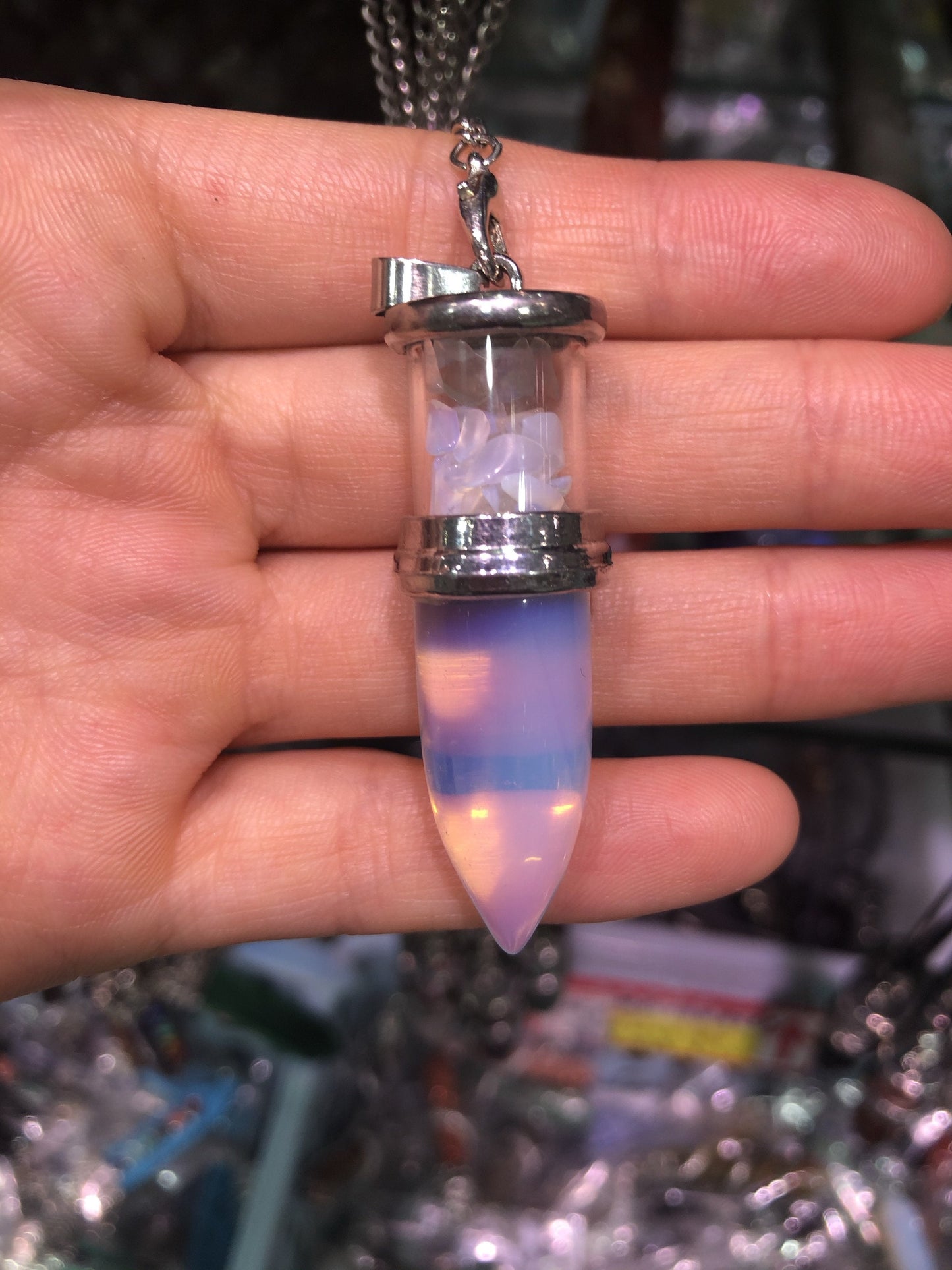 Crystal bullet with gravel pendent