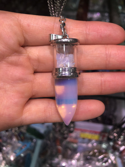 Crystal bullet with gravel pendent