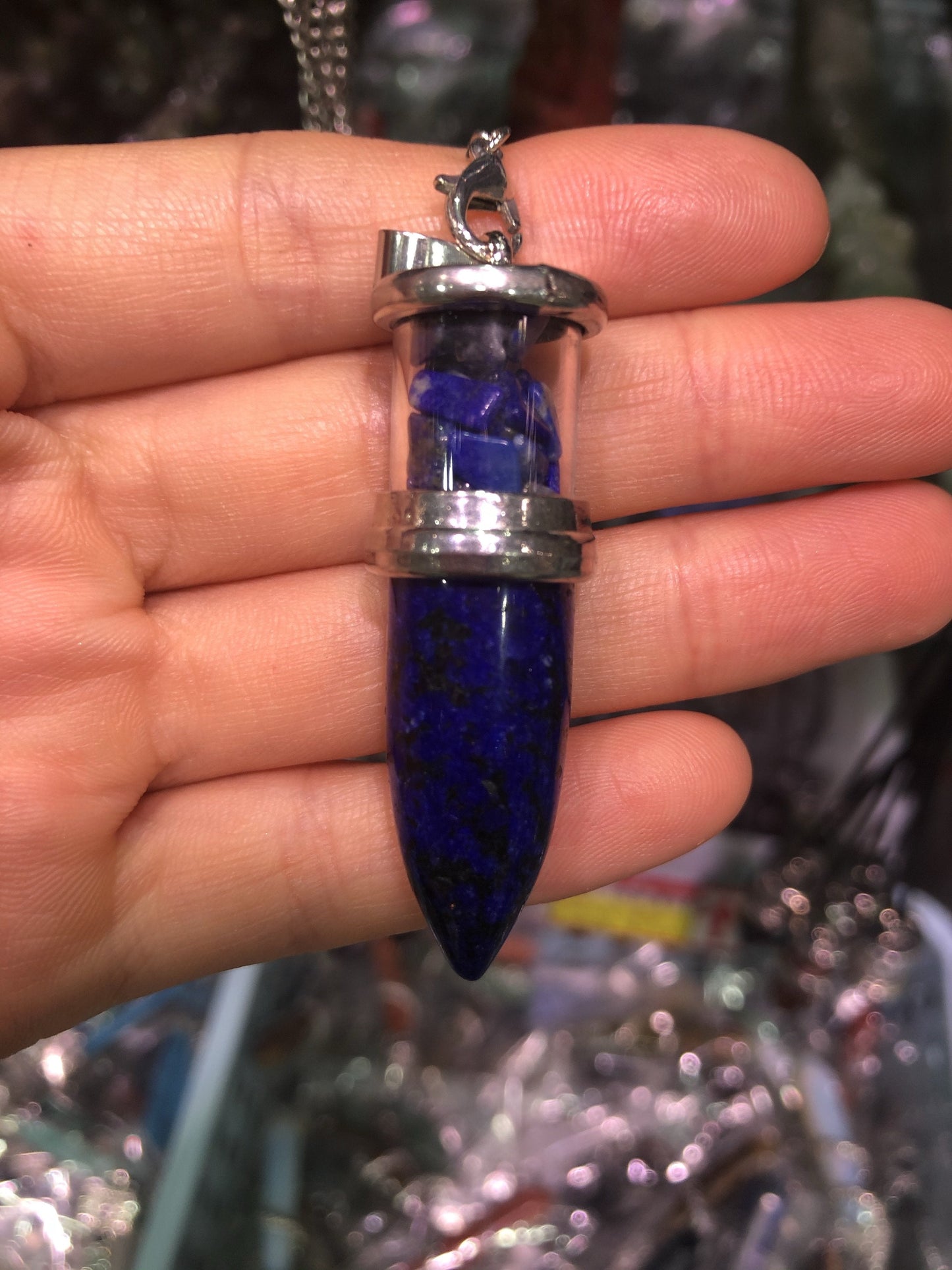 Crystal bullet with gravel pendent