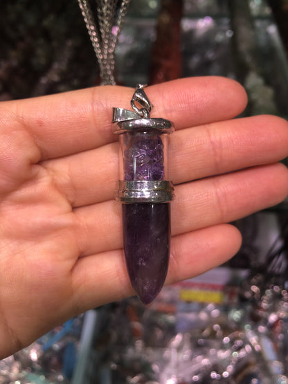 Crystal bullet with gravel pendent