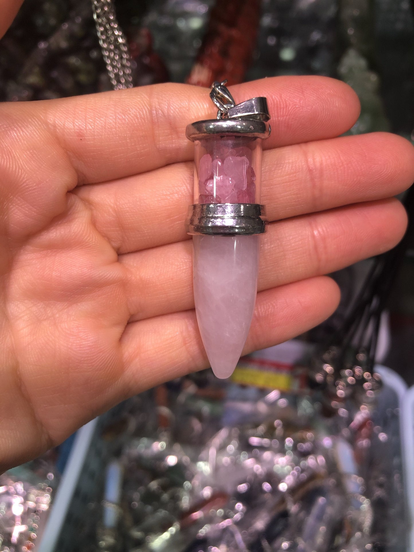 Crystal bullet with gravel pendent