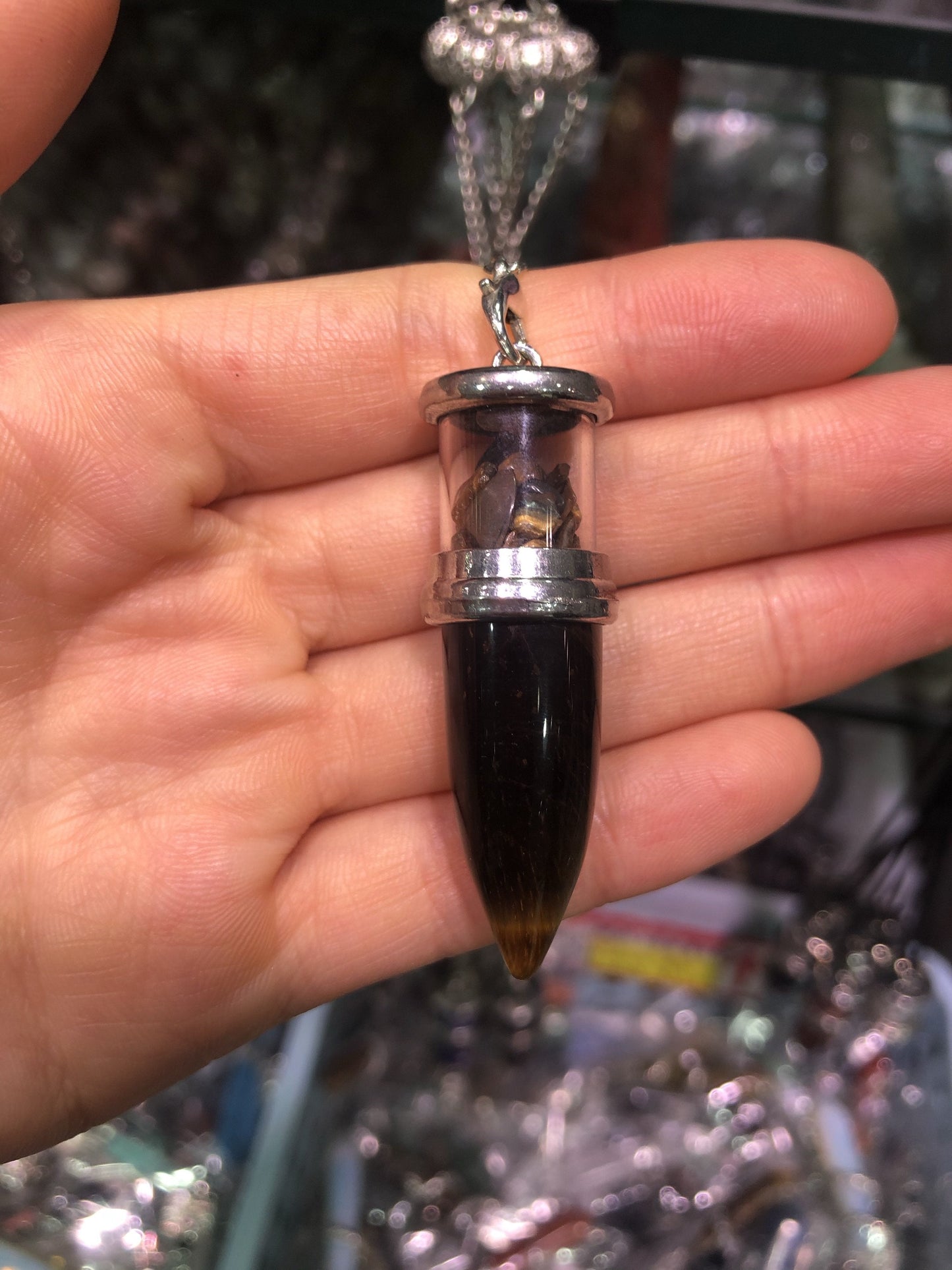 Crystal bullet with gravel pendent