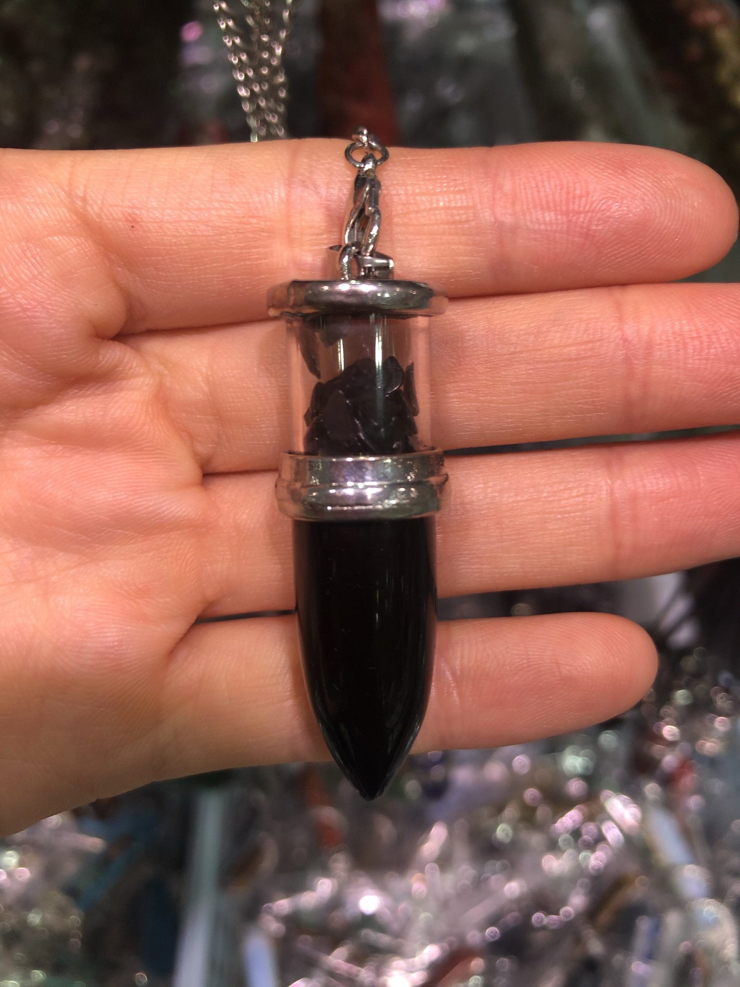 Crystal bullet with gravel pendent